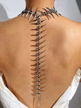 Cargar la imagen en la vista de la galería, The spiked collar section shown worn at the neck and shoulder