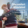 Load image into Gallery viewer, Lifestyle image with the bottle, describing eased discomfort