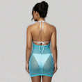 Cargar la imagen en la vista de la galería, Back view of the aqua fishnet cover-up dress showing the low open scoop back