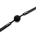 Load image into Gallery viewer, Close view of the solid silicone ball between the two moulded tabs that carry the gold D-rings