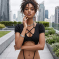 Load image into Gallery viewer, Waist-up rooftop portrait showing the strapped bust and puff sleeves