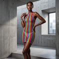 Cargar la imagen en la vista de la galería, The dress worn against a plain wall, showing how sheer the net is