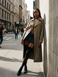 Cargar la imagen en la vista de la galería, Black garter stockings with a denim mini skirt and trench coat in daylight