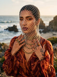 Cargar la imagen en la vista de la galería, Pale rhinestone net veil in golden-hour coastal light, layered with gold collar necklaces