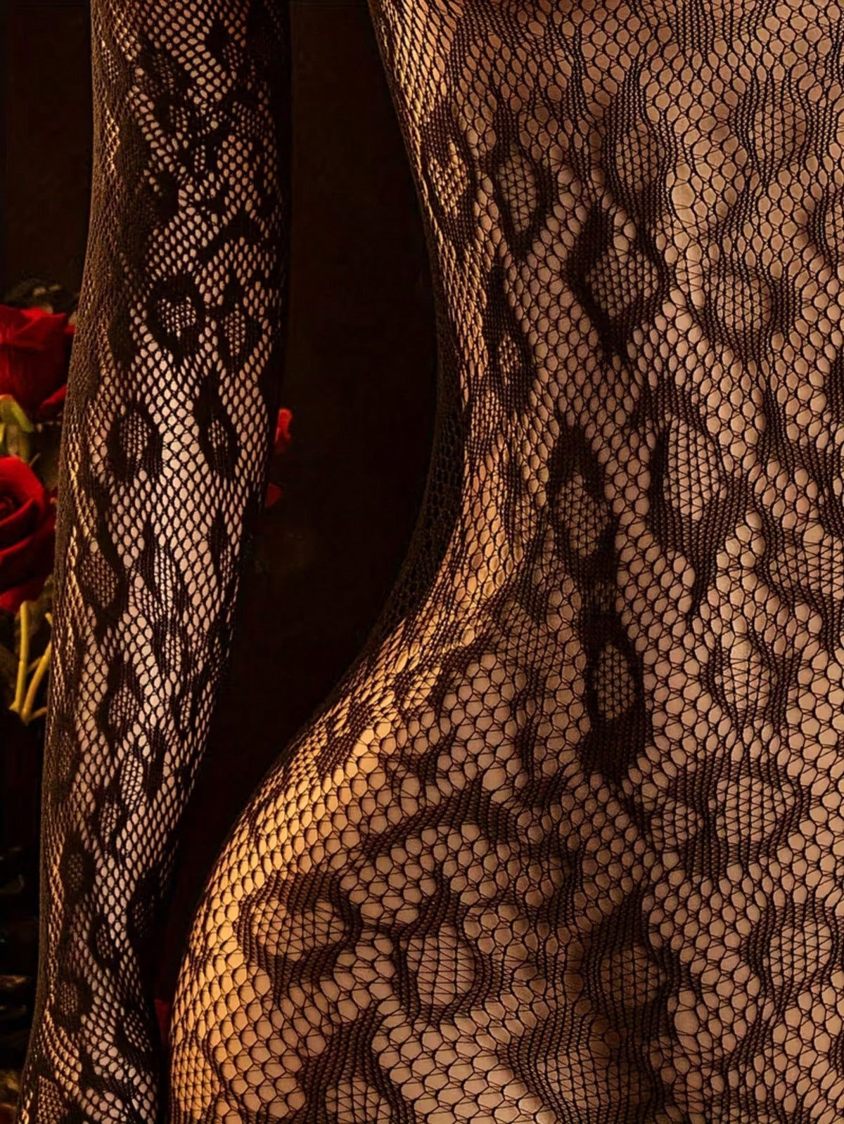 Close-up of the leopard-spot lace and the finer fishnet side panel