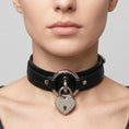 Load image into Gallery viewer, Black faux leather heart-lock choker with silver hardware worn at the throat
