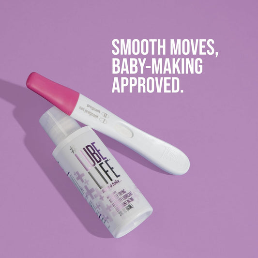 LubeLife fertility lubricant bottle beside a pregnancy test