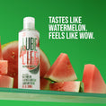 Load image into Gallery viewer, LubeLife watermelon lubricant bottle beside fresh watermelon slices
