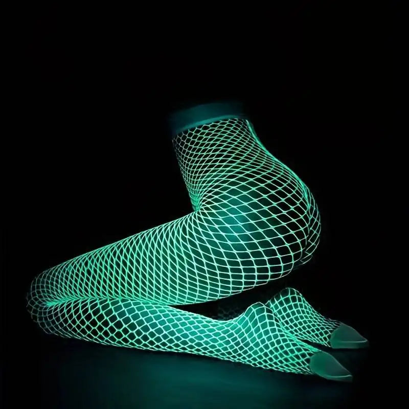 The tights glowing green against a dark background