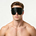 Load image into Gallery viewer, Padded black leather blindfold worn, front view
