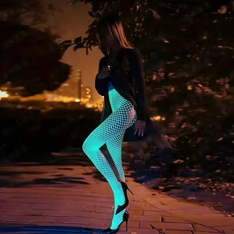 The tights worn outdoors at night, the net glowing green