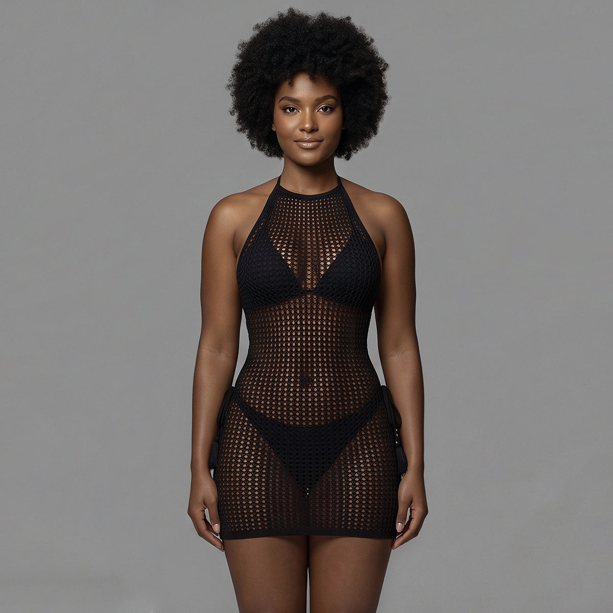 Black fishnet halter mini cover-up dress, front view on a model