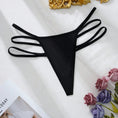 Load image into Gallery viewer, Black triple-strap thong laid flat, full garment
