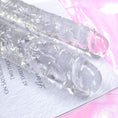 Load image into Gallery viewer, Clear double-ended dildo in use context
