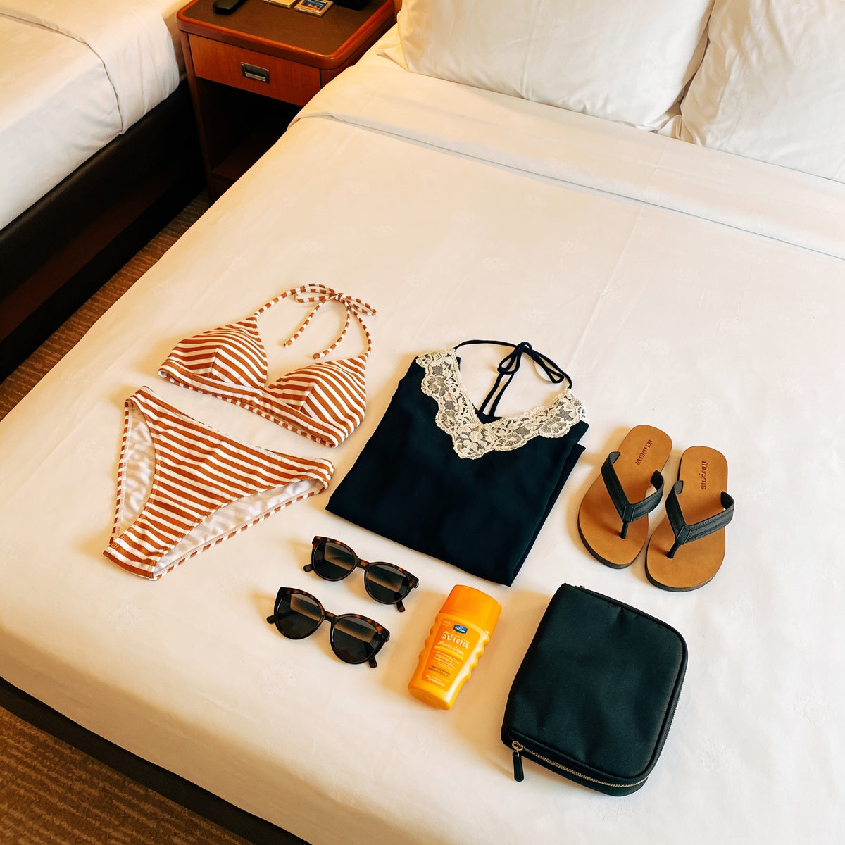 Couple packing for an Icon of the Seas cruise from Miami