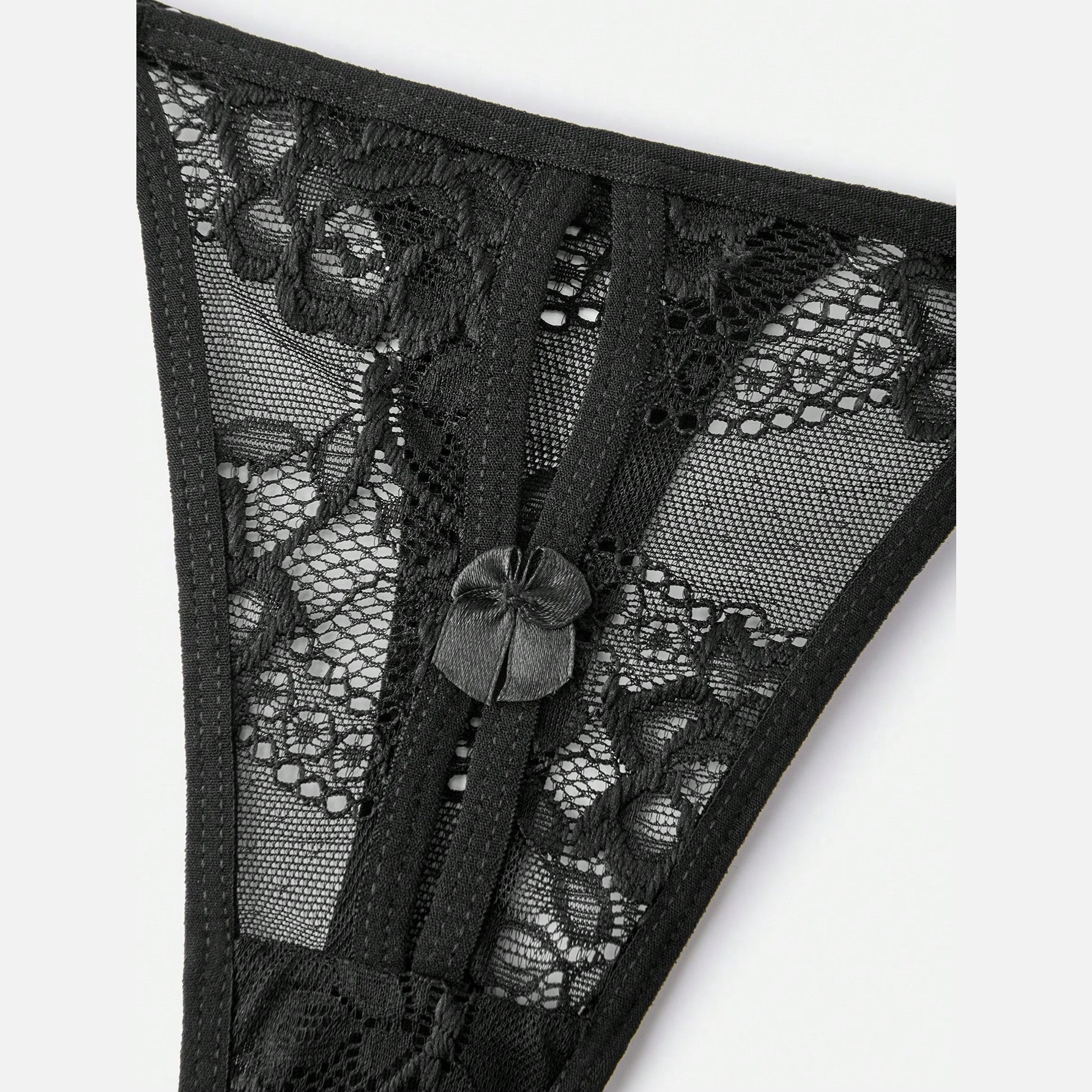 Floral lace detail with bow at the base
