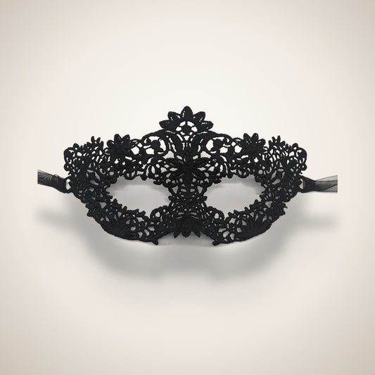 Black filigree lace masquerade mask, studio product shot