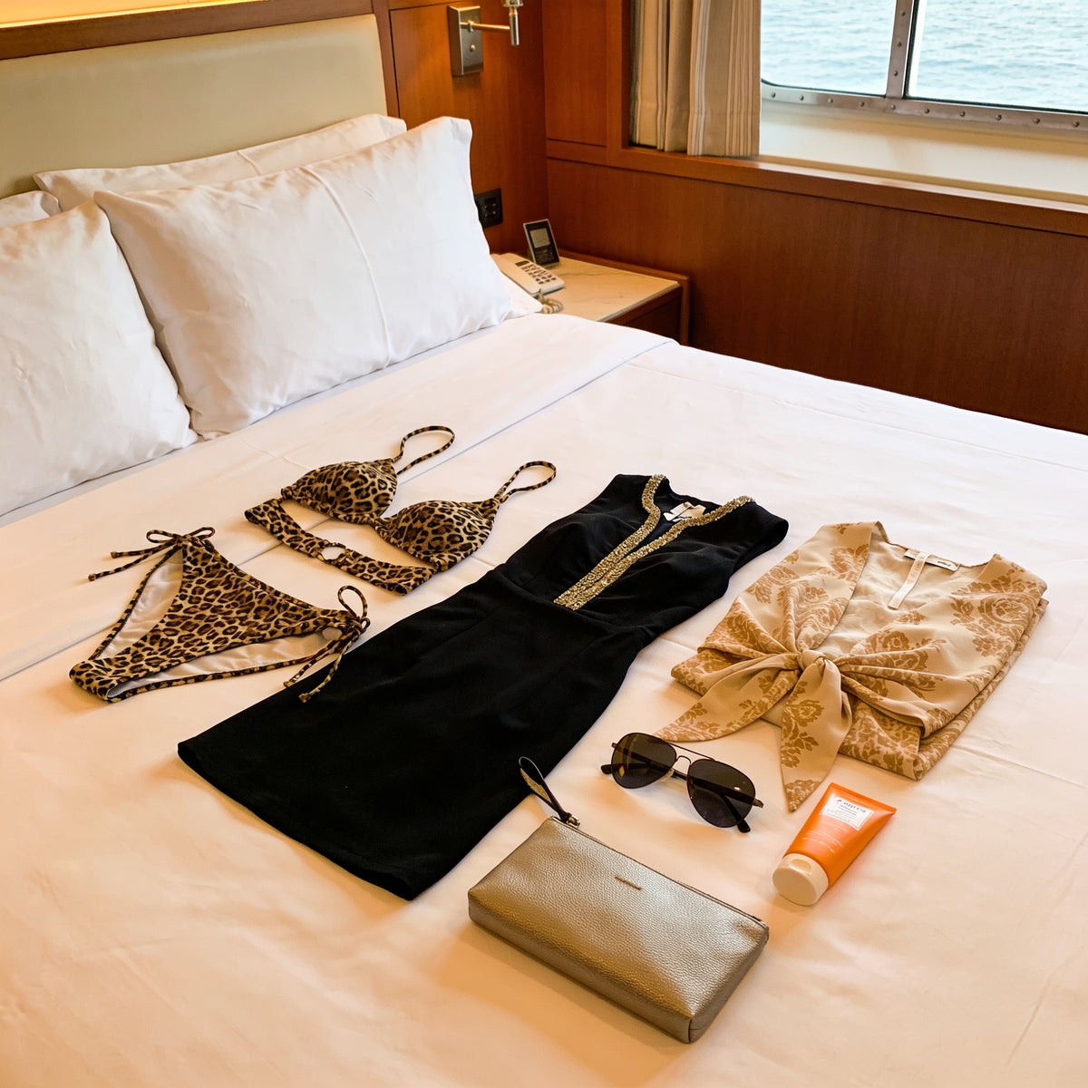Couple packing for an Icon of the Seas cruise from Miami