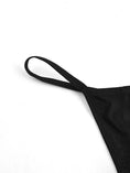 Load image into Gallery viewer, Black cotton G-string shown at an angle with the side strap and back loop
