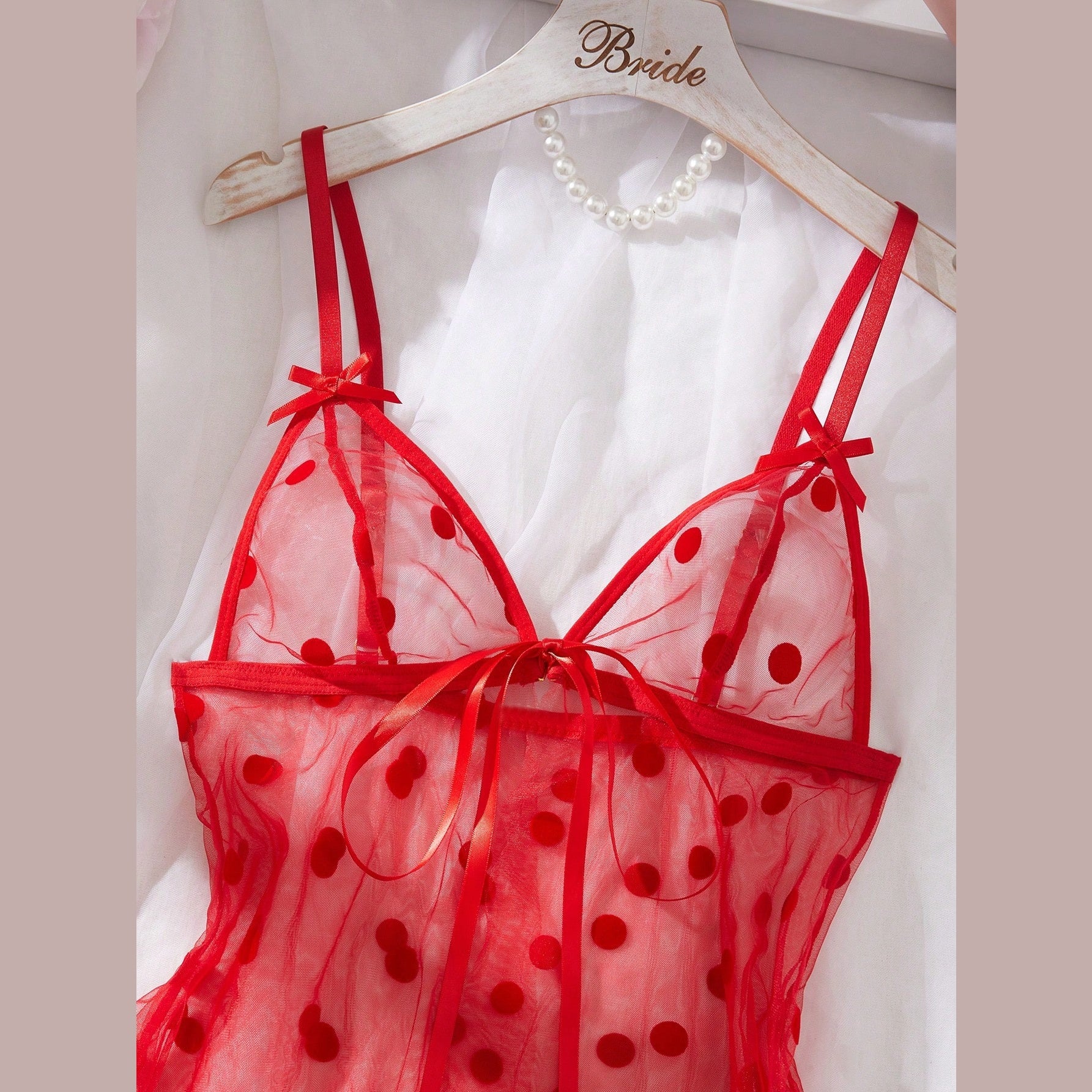 Sheer red babydoll chemise with bow tie shoulder straps