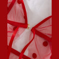 Load image into Gallery viewer, Close up of the red mesh fabric and bow detail
