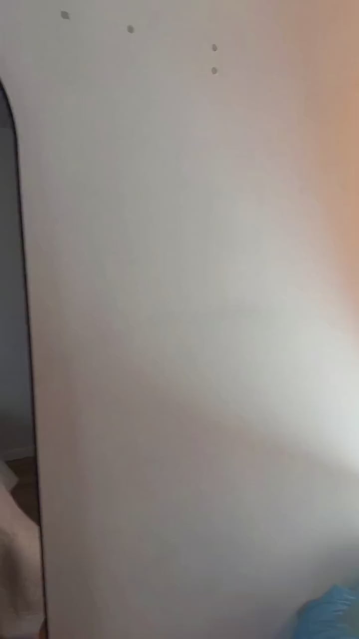 Full-length view of the bodystocking in a mirror