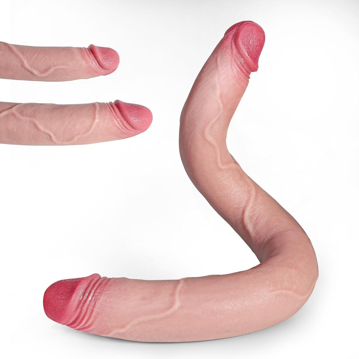 Close-up of both realistic heads of the double-ended dildo, with veins along the shaft