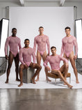 Cargar la imagen en la vista de la galería, Five models wearing the pink fishnet bodysuit on a studio sweep
