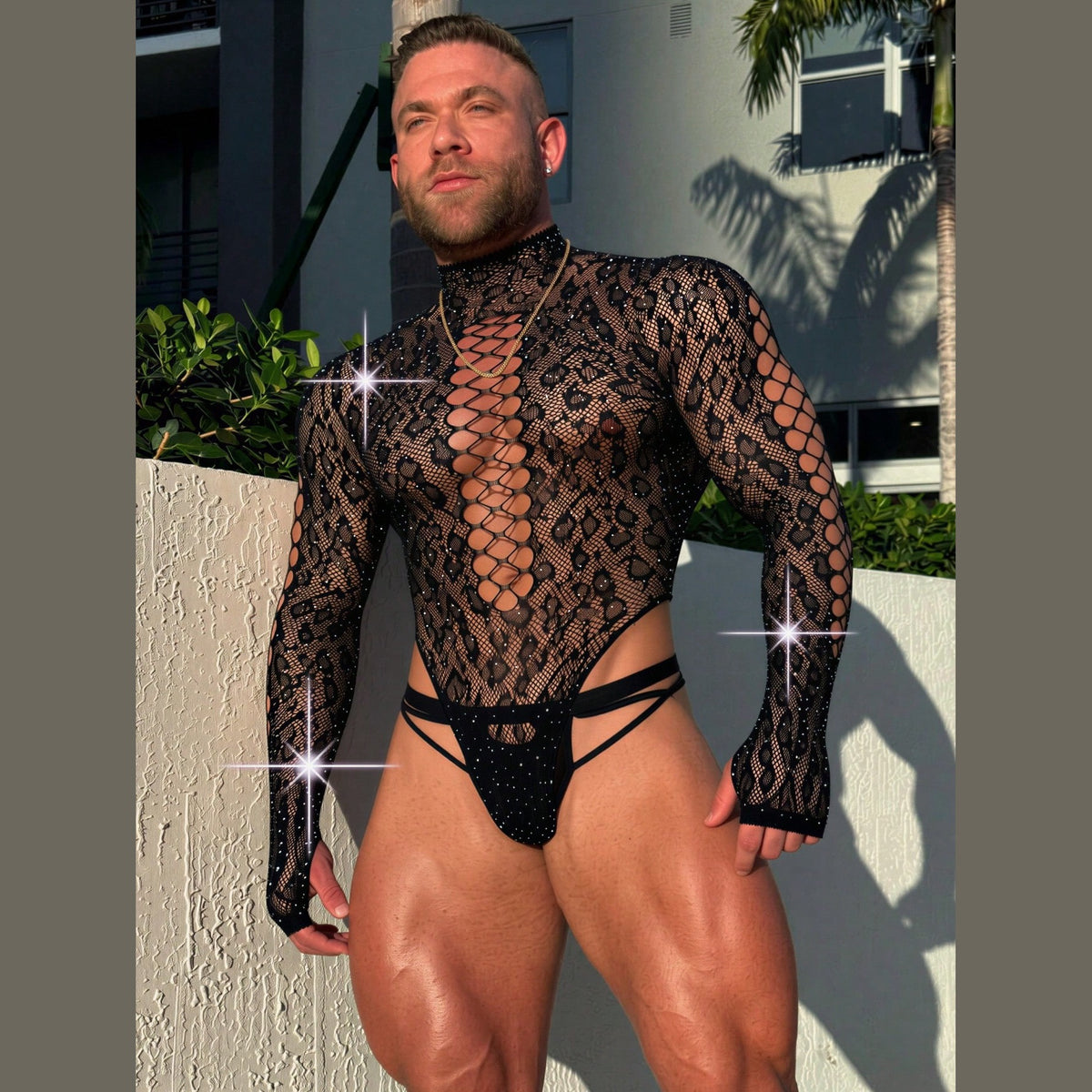 Black leopard lace bodysuit for men, worn front view